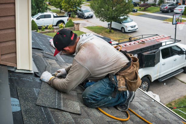 Professional Roof Replacement technician working in Dana, IN